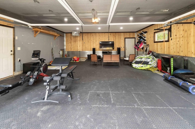 garage featuring wooden walls