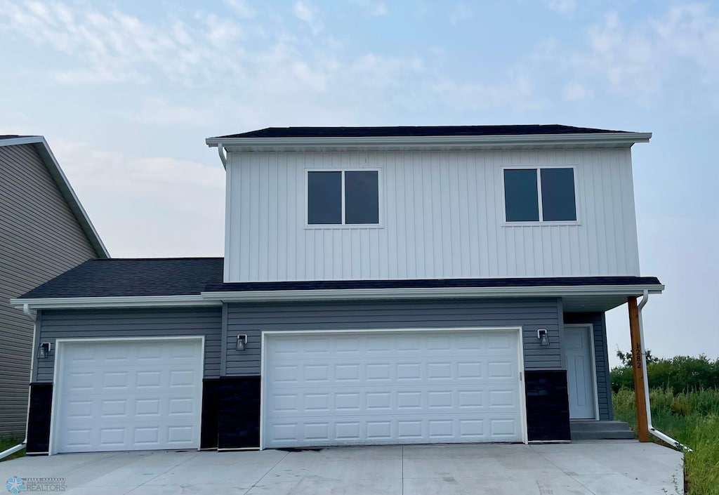 front of property featuring a garage