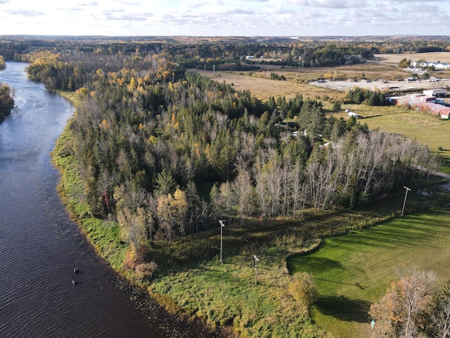 birds eye view of property featuring a rural view and a water view