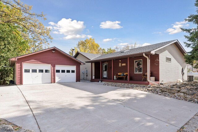 ranch-style house with covered porch and central air condition unit