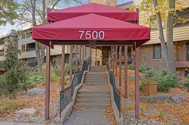 7500 Cahill Rd Unit 202C, Edina, MN 55439 - view of front of home featuring brick siding and stairway