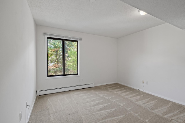 7500 Cahill Rd Unit 202C, Edina, MN 55439 - carpeted spare room featuring baseboard heating, a textured ceiling, and baseboards