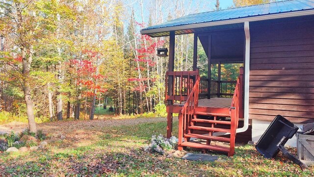 view of yard featuring a wooden deck