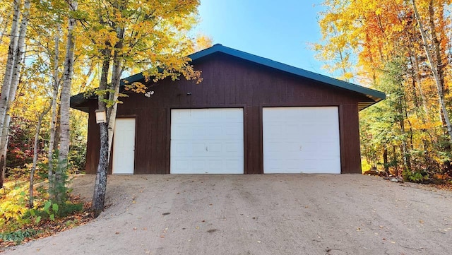 garage with wood walls