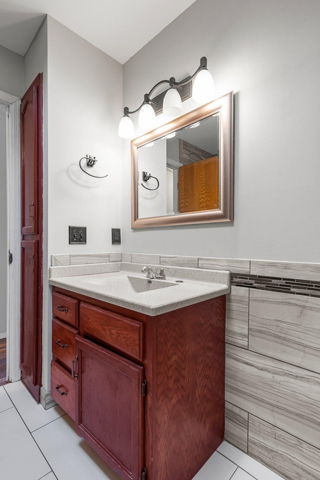 bathroom featuring tile patterned floors and vanity