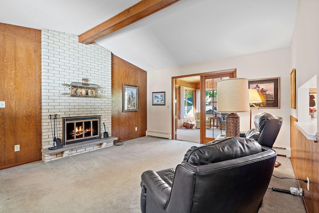 carpeted living room with vaulted ceiling with beams, wood walls, baseboard heating, and a fireplace