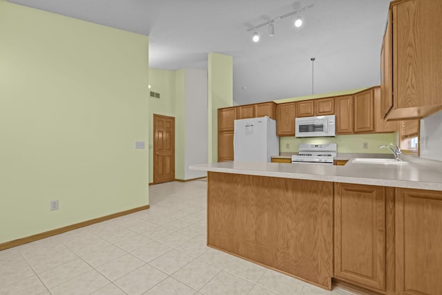 kitchen with kitchen peninsula, white appliances, sink, high vaulted ceiling, and light tile patterned flooring