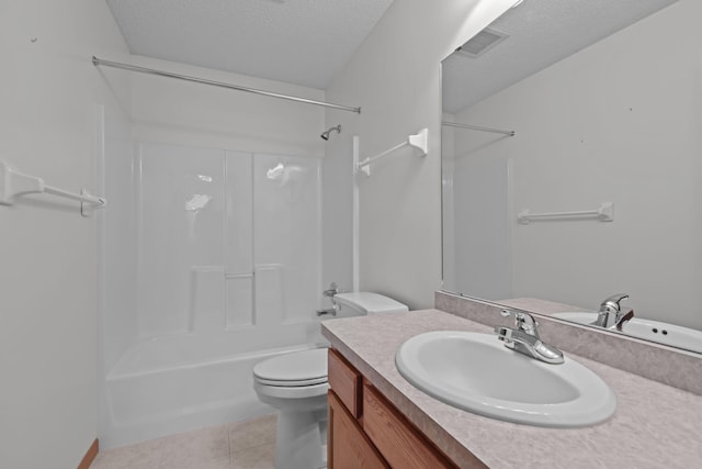 full bathroom featuring vanity, bathing tub / shower combination, tile patterned floors, toilet, and a textured ceiling