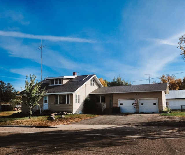 view of front of property featuring a garage