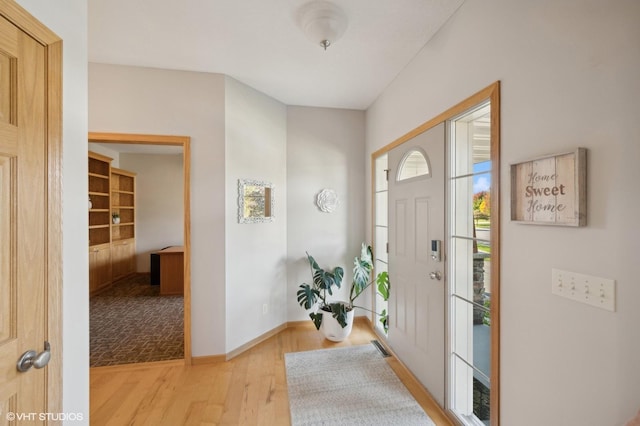 entrance foyer featuring light hardwood / wood-style floors