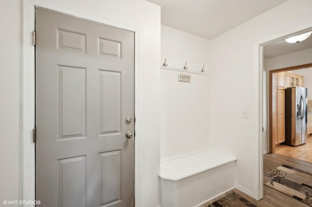 mudroom with hardwood / wood-style floors