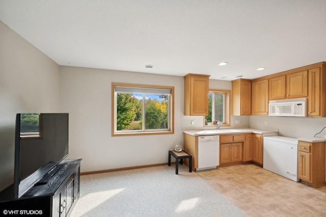 kitchen featuring white appliances