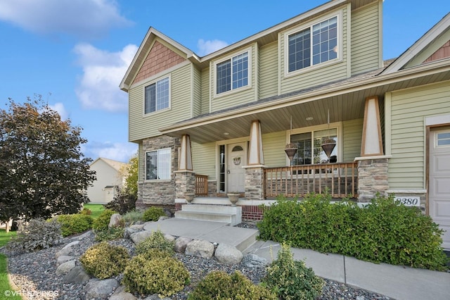 craftsman inspired home with a porch