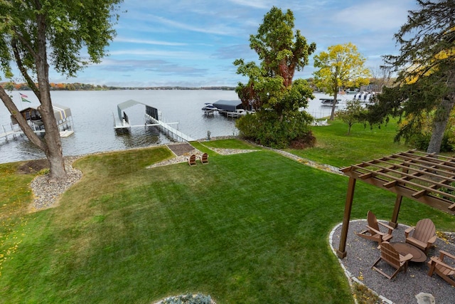 2172 Shadywood Rd, Orono, MN 55391 - view of green lawn featuring boat lift, a dock, and a water view