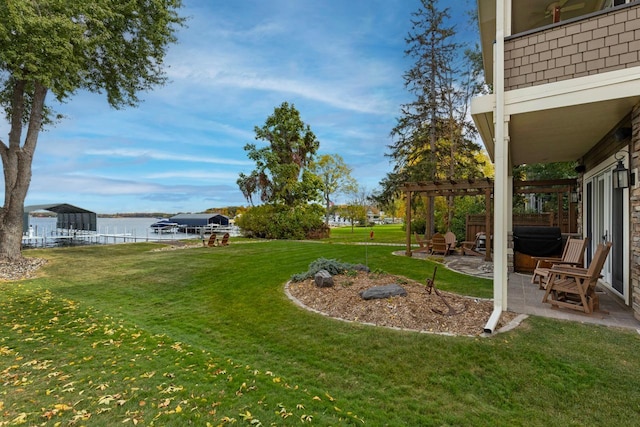 2172 Shadywood Rd, Orono, MN 55391 - view of grassy yard featuring a patio and a water view