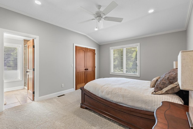 2172 Shadywood Rd, Orono, MN 55391 - carpeted bedroom featuring crown molding, vaulted ceiling, baseboards, a closet, and ceiling fan