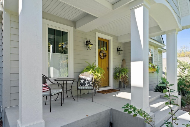 entrance to property with covered porch