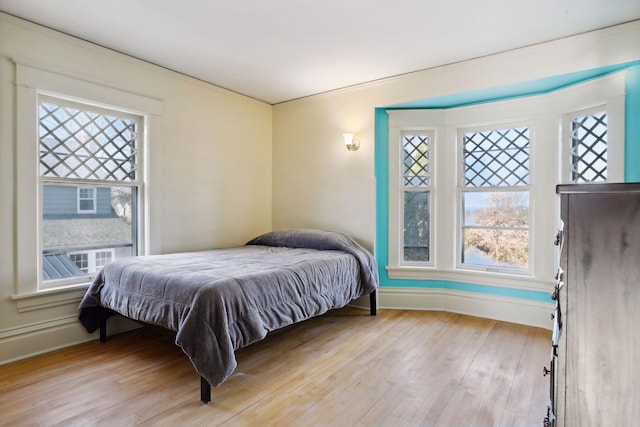 bedroom featuring light wood-type flooring