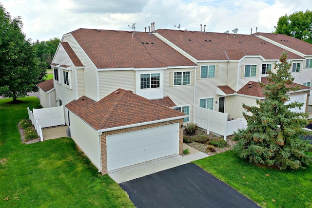 back of property featuring a lawn