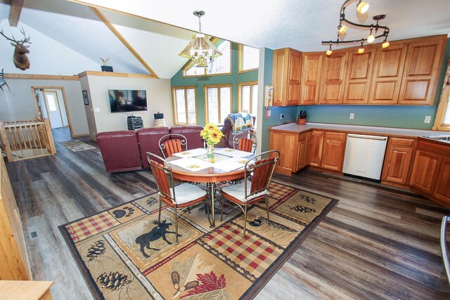 dining room with lofted ceiling, an inviting chandelier, and dark hardwood / wood-style flooring