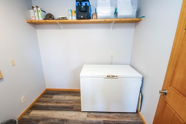 laundry room featuring dark hardwood / wood-style floors