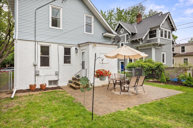 4512 47th Ave S, Minneapolis, MN 55406 - rear view of property with a patio area