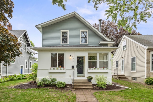 4512 47th Ave S, Minneapolis, MN 55406 - view of front facade with entry steps and a front yard