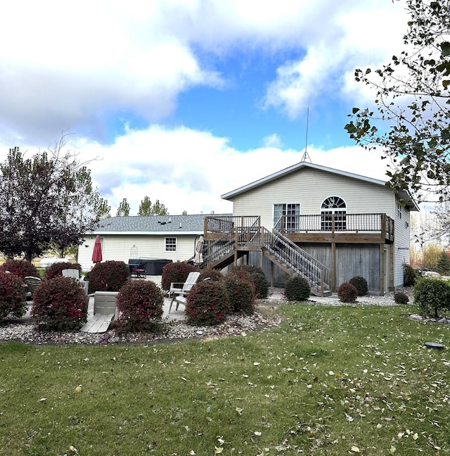 view of property exterior featuring a lawn and a wooden deck