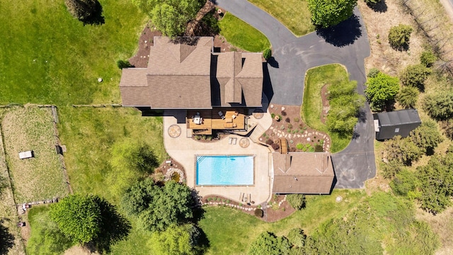 drone / aerial view of a pool area