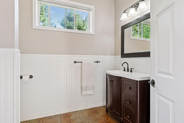 bathroom featuring wainscoting and vanity