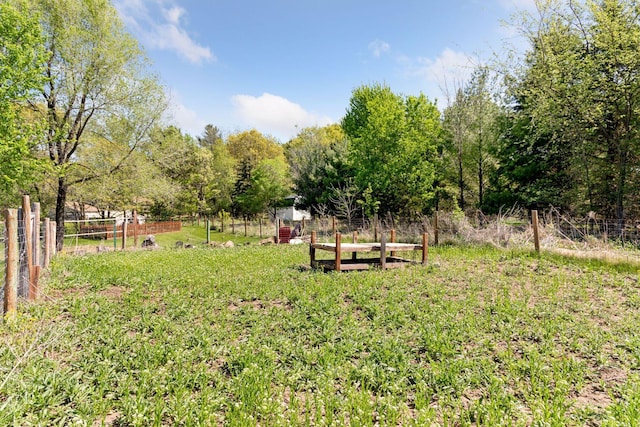 view of yard featuring fence