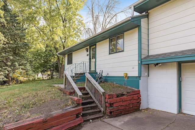 view of property exterior featuring a garage