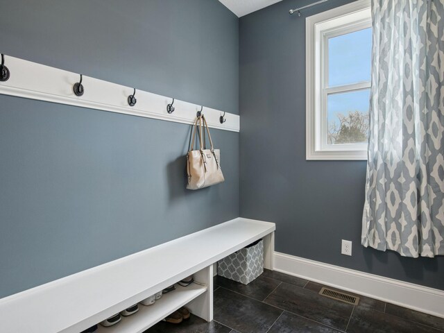 mudroom featuring visible vents and baseboards