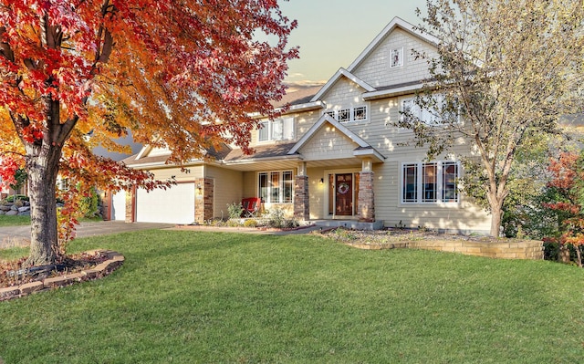 craftsman-style home with a yard