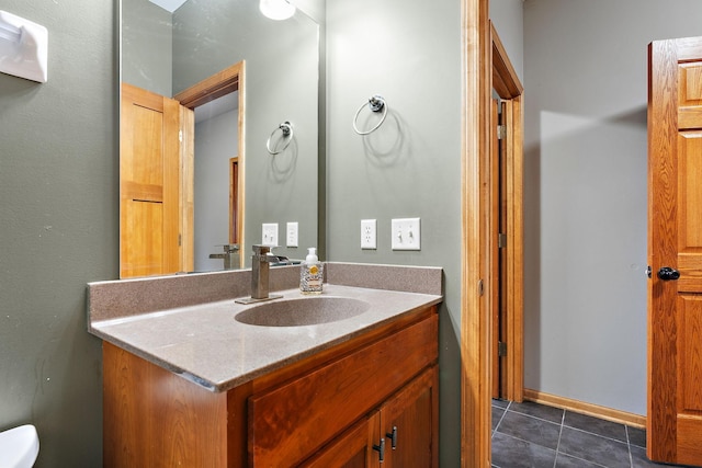 bathroom featuring tile patterned floors and vanity