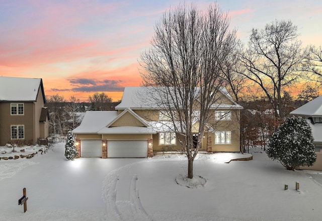 view of front of home with a garage