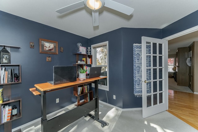 office space with hardwood / wood-style floors, vaulted ceiling, and ceiling fan