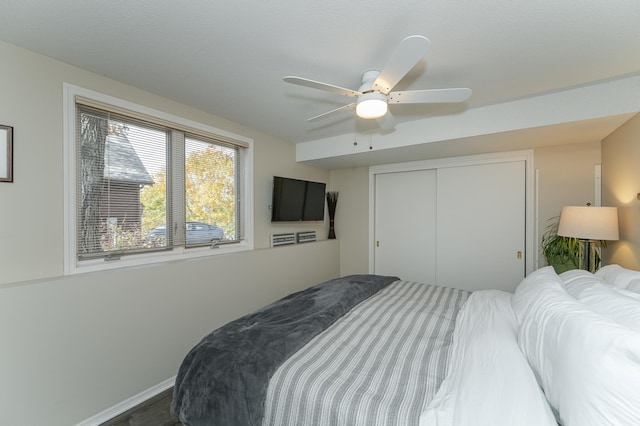 bedroom with a closet and ceiling fan