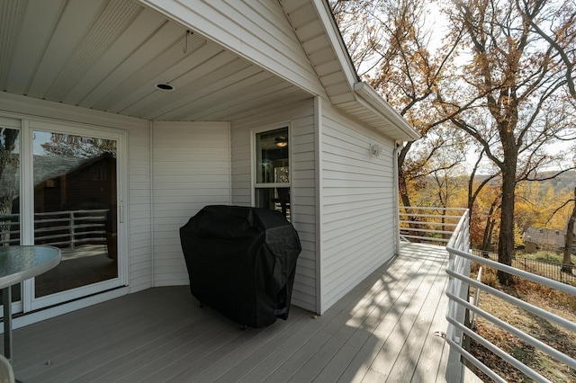 wooden deck featuring grilling area