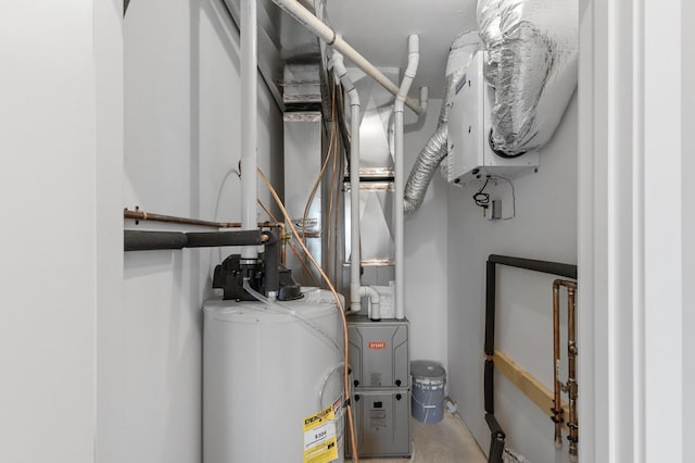 utility room with water heater