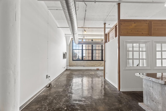 unfurnished room with plenty of natural light