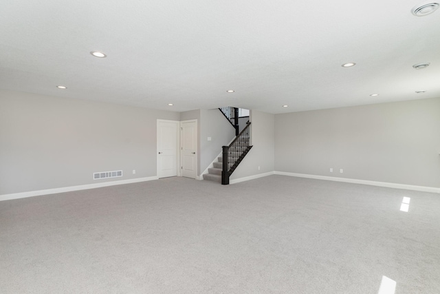 unfurnished room featuring carpet flooring