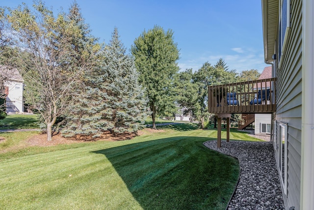 view of yard with a deck