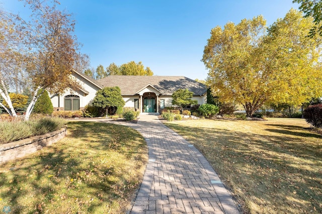 view of front of property with a front lawn