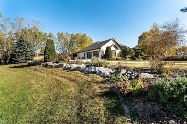 view of yard with a garage