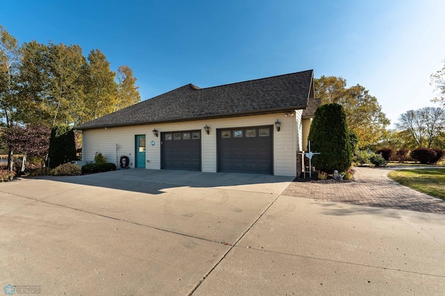 view of home's exterior with a garage