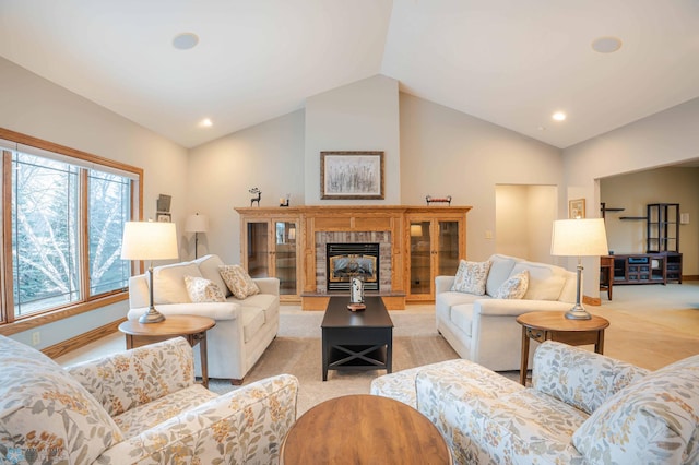 living room featuring lofted ceiling