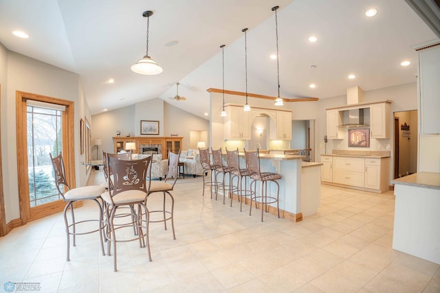 dining space featuring lofted ceiling