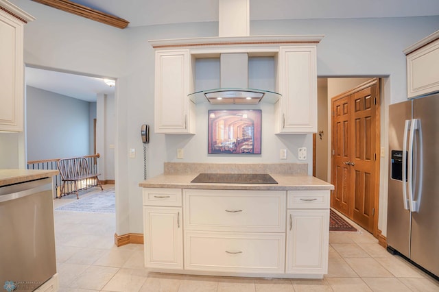 kitchen with appliances with stainless steel finishes, crown molding, wall chimney exhaust hood, and light tile patterned flooring