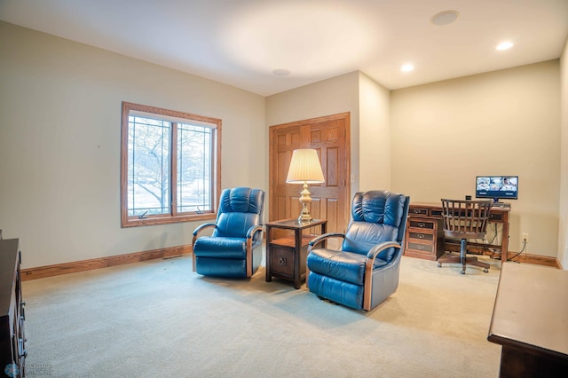 sitting room with light colored carpet